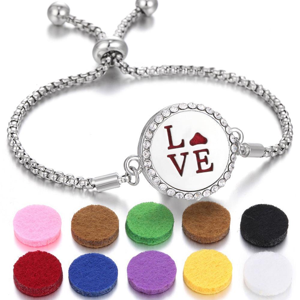 Silver aroma bracelet with LOVE heart charm and color aroma pads