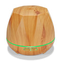 Light wood grain aroma diffuser with green LED ring and control display