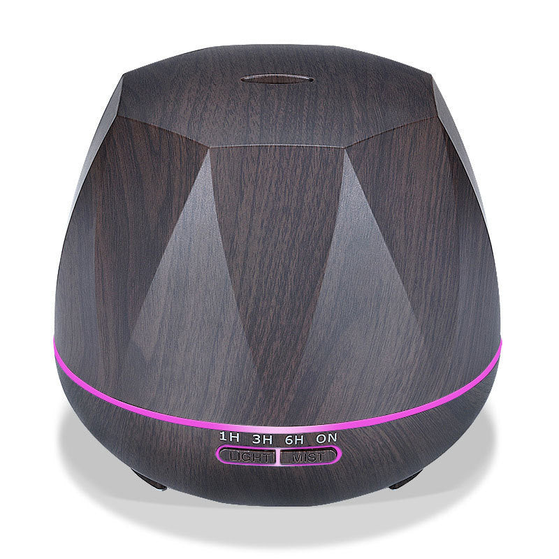 Dark wood grain aroma diffuser with magenta LED ring and control buttons