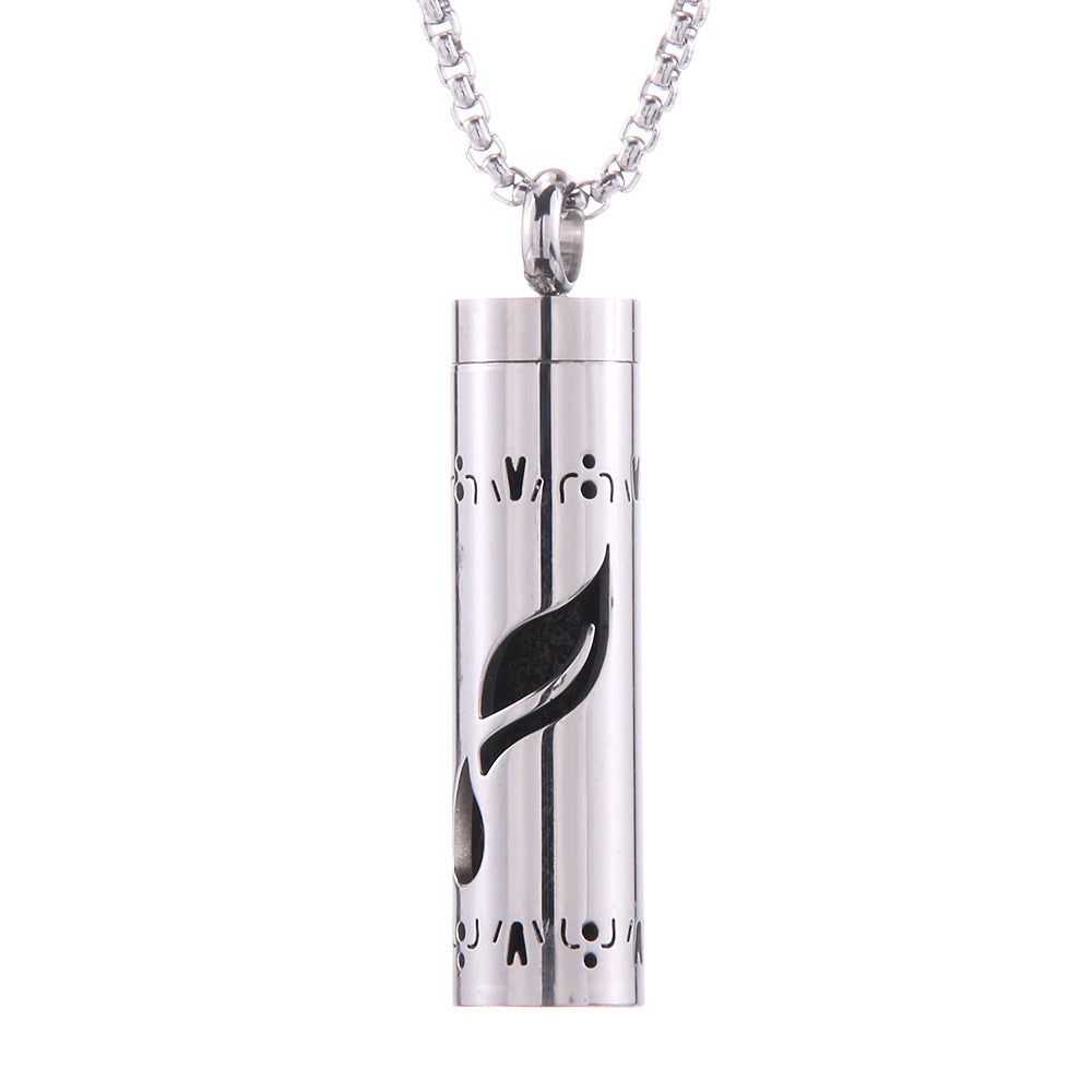 Aroma pendant cylinder with black motif graphic in vertical window, silver-tone chain