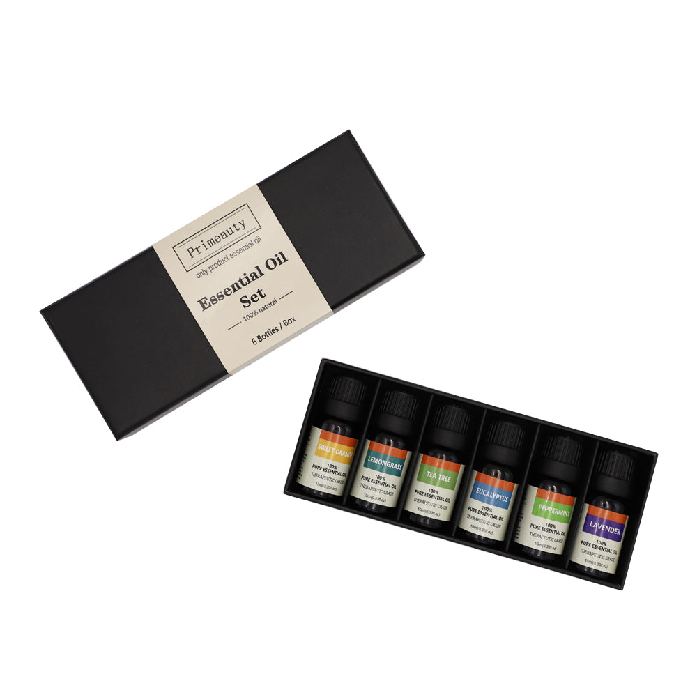 Essential Oil Set gift set with lid open, showing six small oil bottles in tray