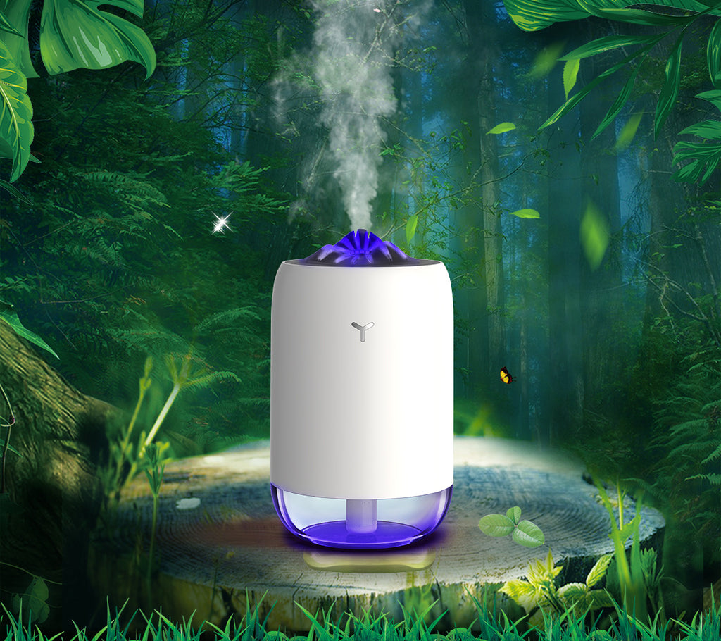 White USB aroma diffuser with purple light glow and black top insert