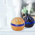 Wood grain essential oil mist diffuser, light brown dome with blue base ring, on icon