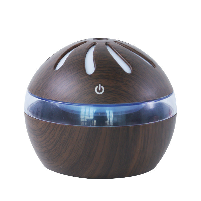 Dark wood-grain mist diffuser dome with blue translucent base and power icon
