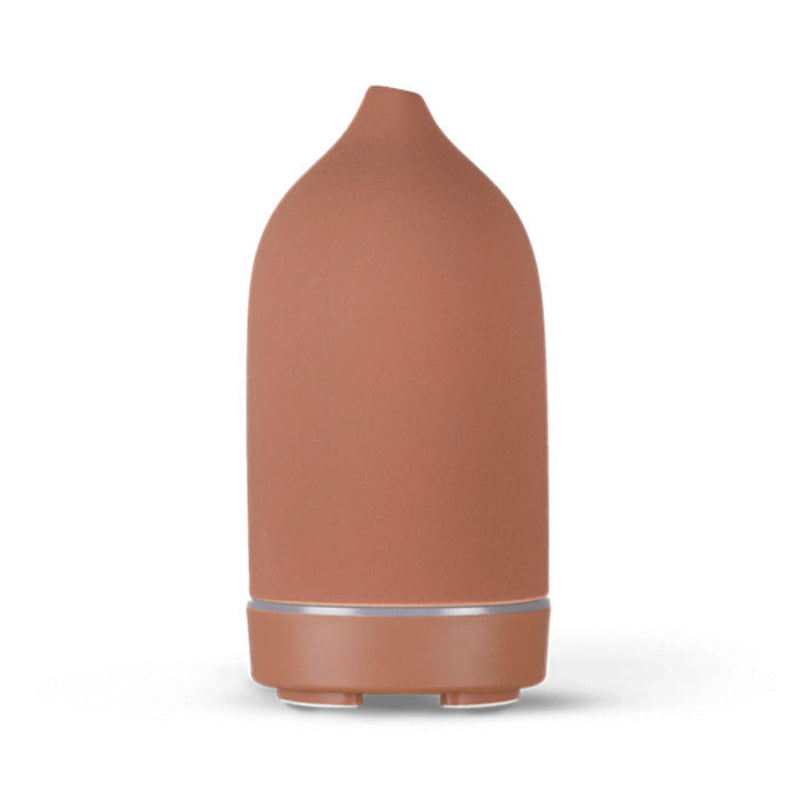 Rose ceramic aroma diffuser with tapered body and rounded base feet