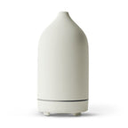 Ivory ceramic aroma diffuser, white bottle shape with base and 3 feet
