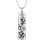 Aroma pendant cylinder with black patterned inlay and silver-tone top clasp on chain