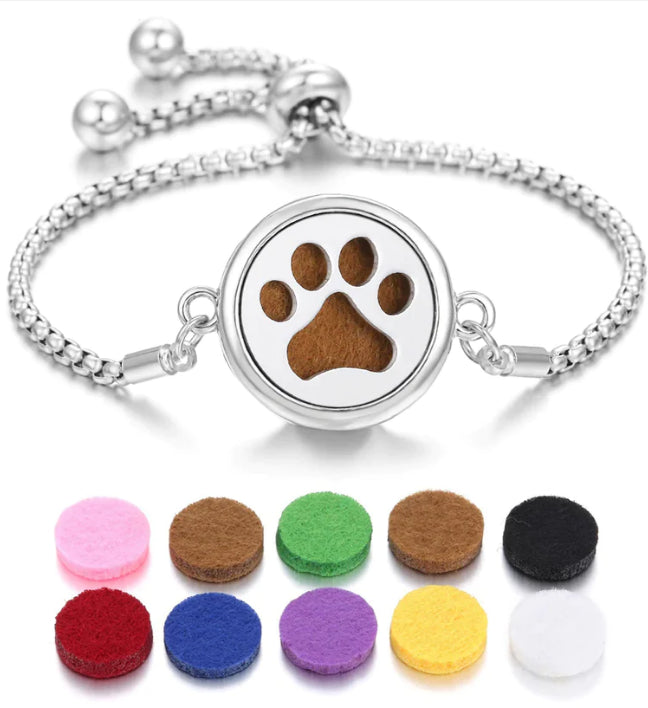 Silver aroma bracelet with paw-print emblem charm and aroma pads