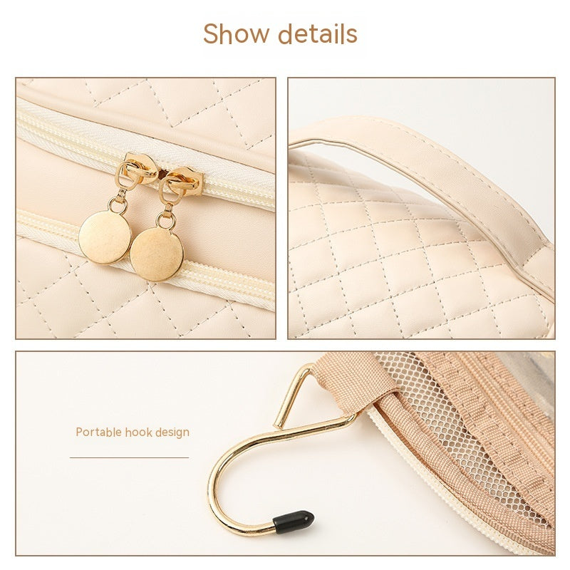 Vanity bag close-up: quilted front, gold zipper pulls, and curved top handle