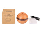 Wood essential oil diffuser kit with USB power cable, manual, and retail box