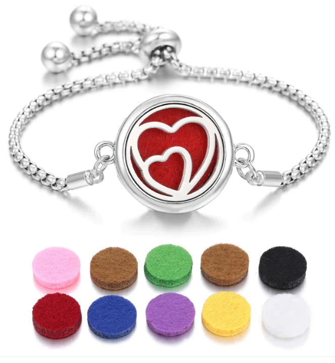 Silver-tone heart locket bracelet with red, green, and other aroma color pads