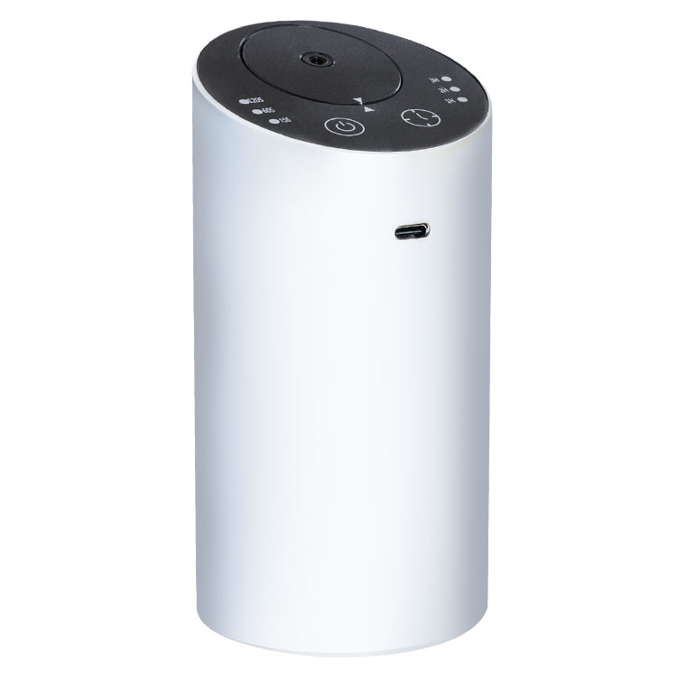 White cylindrical portable USB diffuser with top control icons and USB charging port.