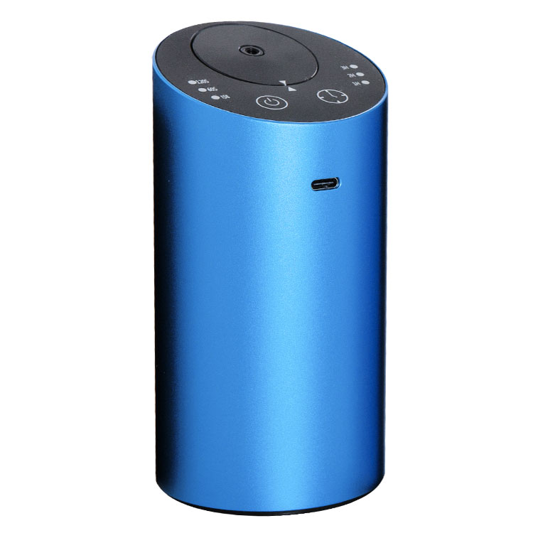 Blue cylindrical portable USB diffuser with top control icons and built-in USB port.