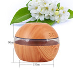 Wood essential oil diffuser, approx 110mm wide and 90mm tall
