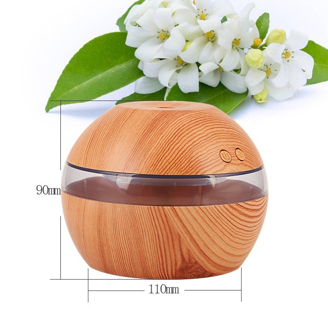 Wood essential oil diffuser, approx 110mm wide and 90mm tall