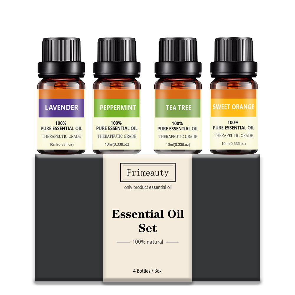 Essential Oil Set box with 4 labeled bottles: lavender, peppermint, tea tree, sweet orange