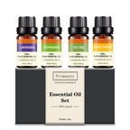 Essential Oil Set box with 4 labeled bottles: lavender, peppermint, tea tree, sweet orange