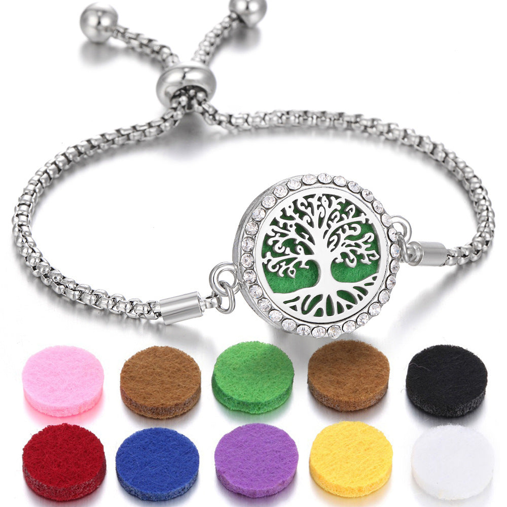 Silver Tree of Life aroma bracelet with round crystal bezel and colorful felt scent pads