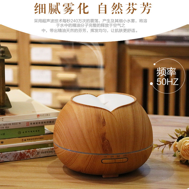 Light wood grain aroma diffuser with glowing white heart on top