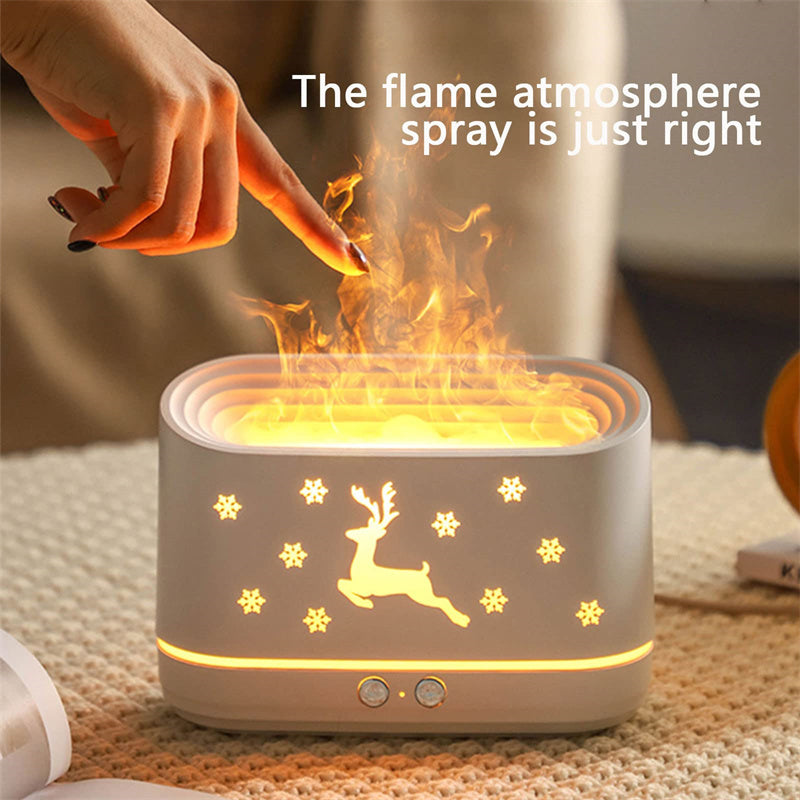 Ivory white elk diffuser with glowing ring and deer silhouette; mist rising with hand near top