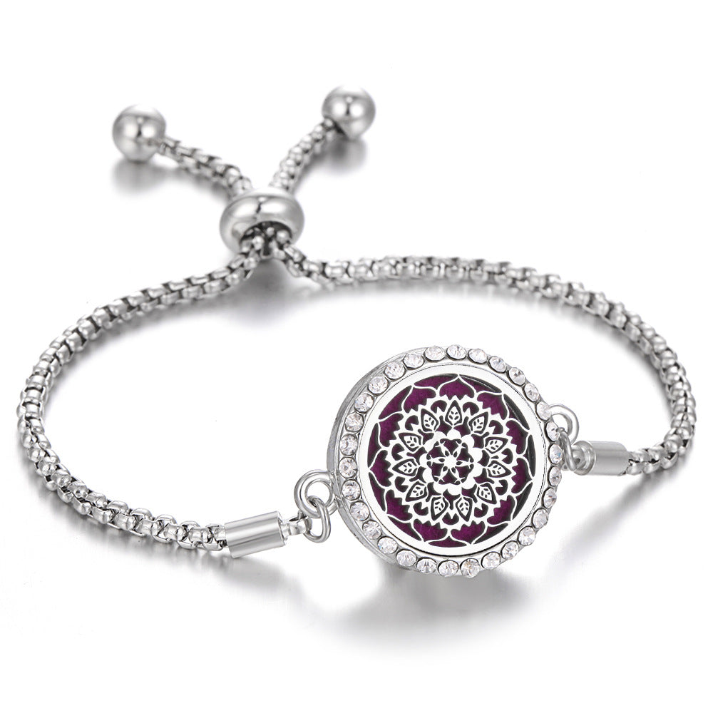 Silver Tree of Life aroma bracelet with purple medallion center and crystal border