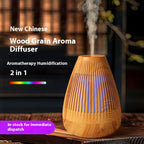 Ultrasonic essential oil diffuser in light wood grain with LED glow and mist stream