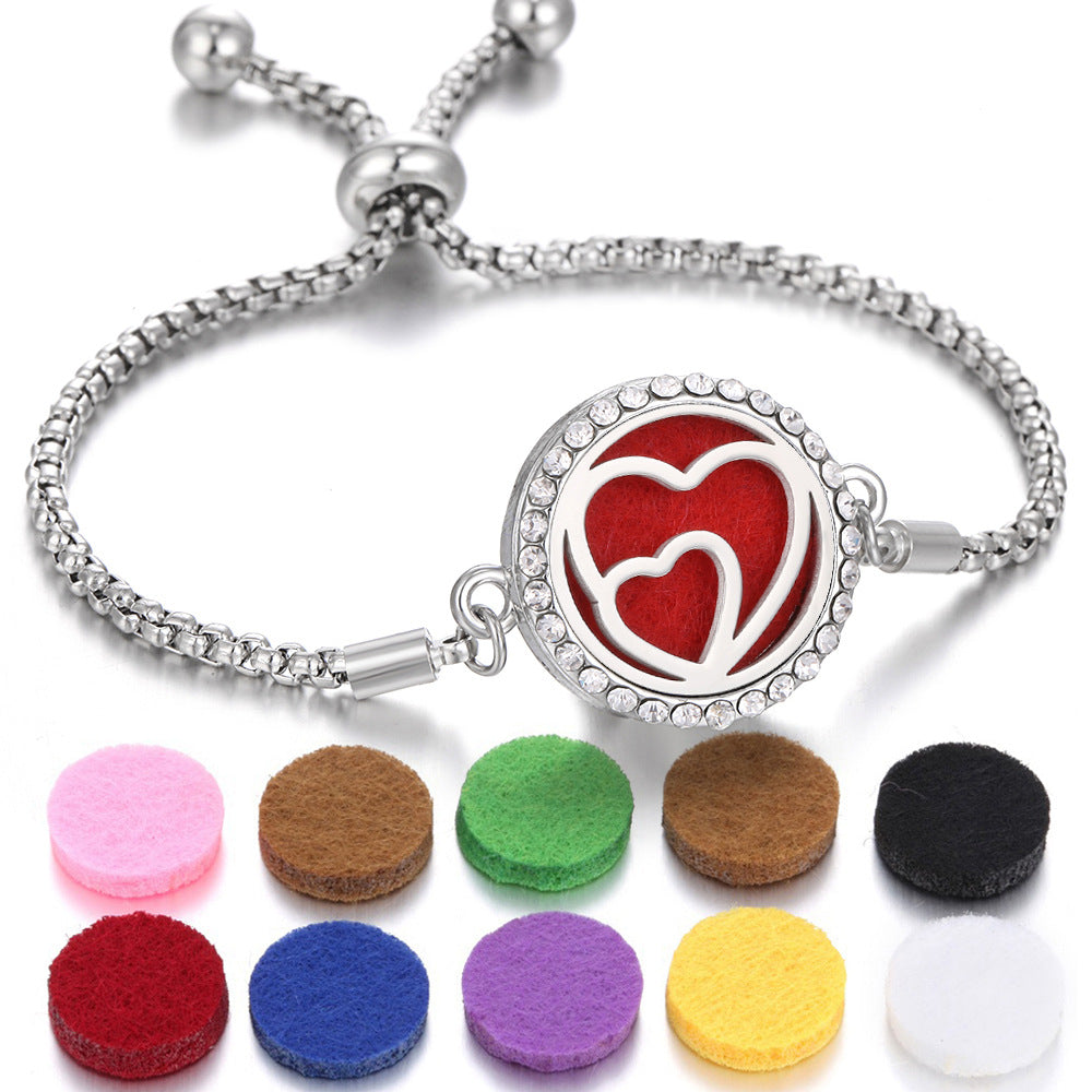 Silver aroma bracelet with red heart charm and aroma pads
