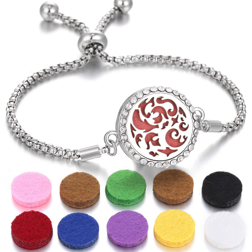 Silver aroma bracelet with red animal motif charm and aroma pads