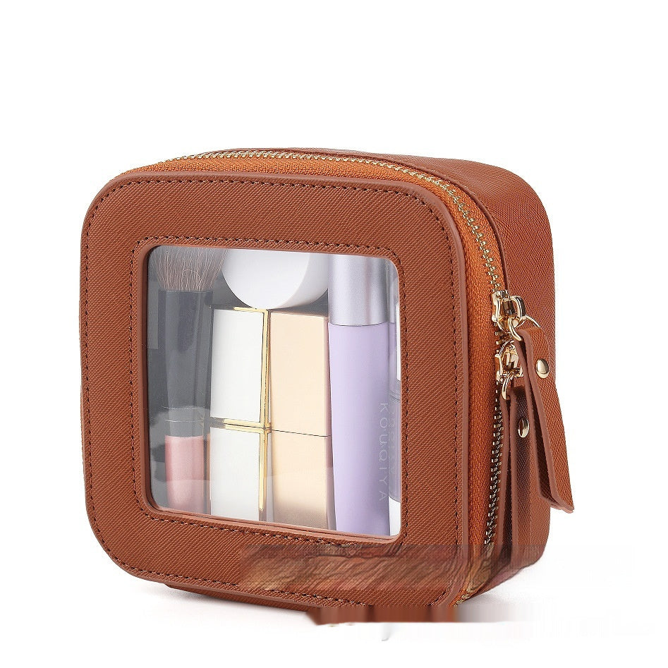 Brown clear cosmetic pouch with gold zipper and clear window