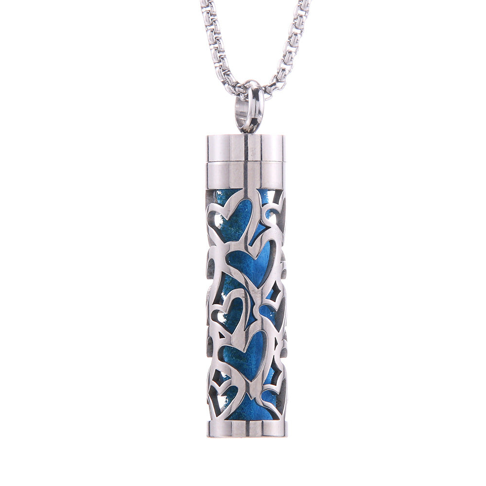 Aroma pendant cylinder with blue geometric pattern and silver-tone metal cap and chain