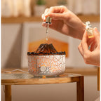 Volcano mist jellyfish diffuser while adding drops into the fill port