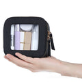 Black clear cosmetic pouch with zip closure, clear window, held in hand