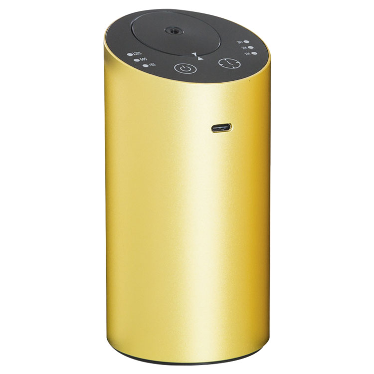 Yellow cylindrical portable USB diffuser with top control icons and USB charging port.