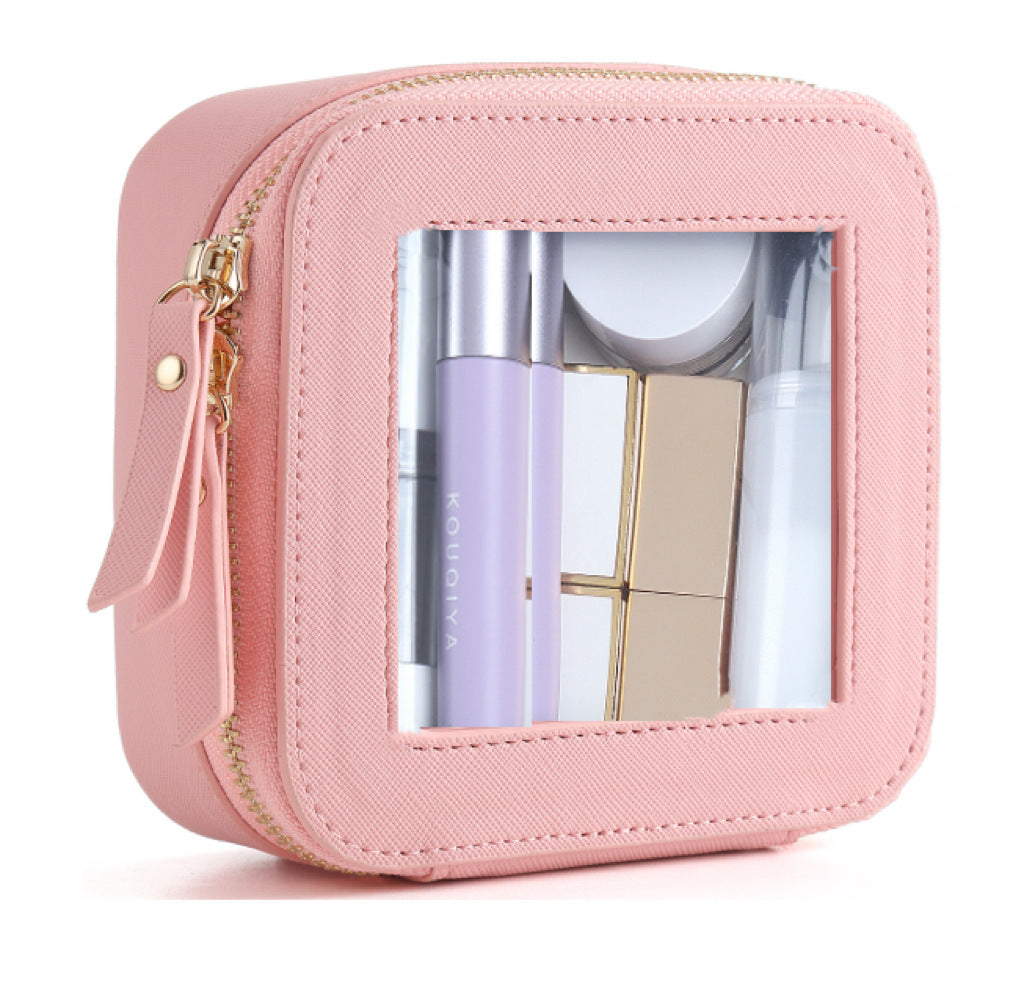 Pink clear travel cosmetic pouch with clear window and wrist strap