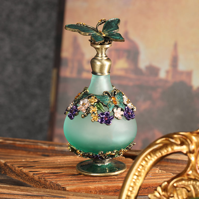 Butterfly perfume oil bottle with mint glass body and colorful floral beaded metal design