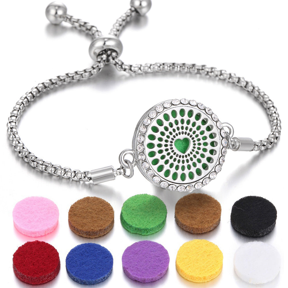 Aroma bracelet with green dot mandala locket and round felt aroma pads
