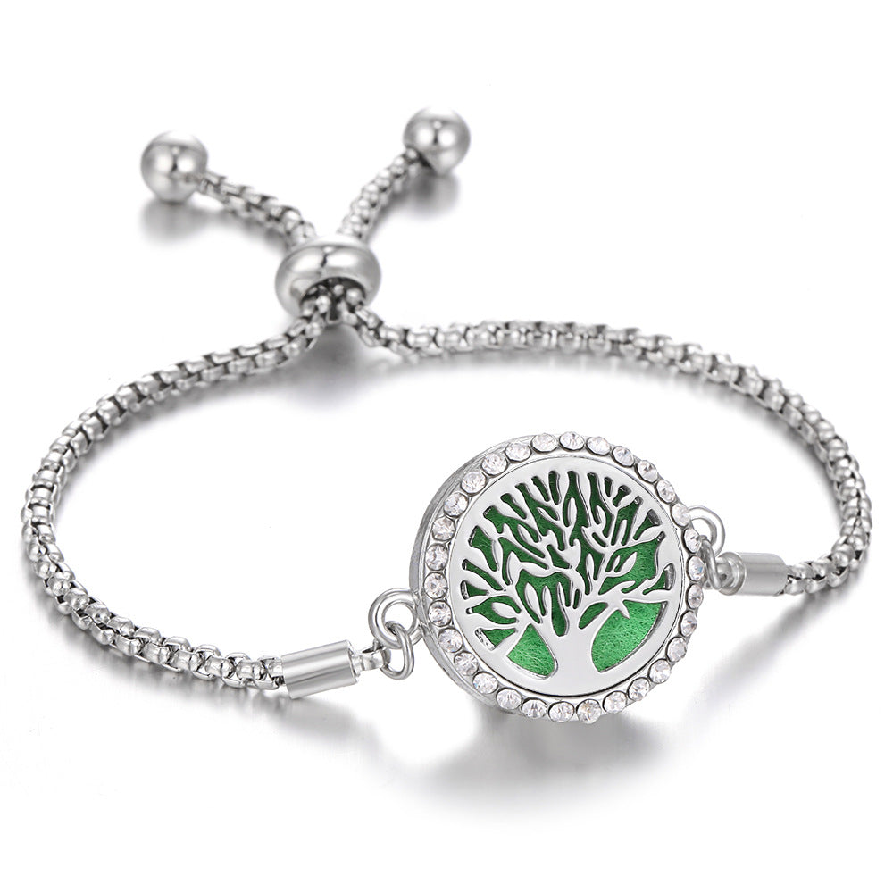 Silver Tree of Life aroma bracelet with green medallion center and crystal bezel
