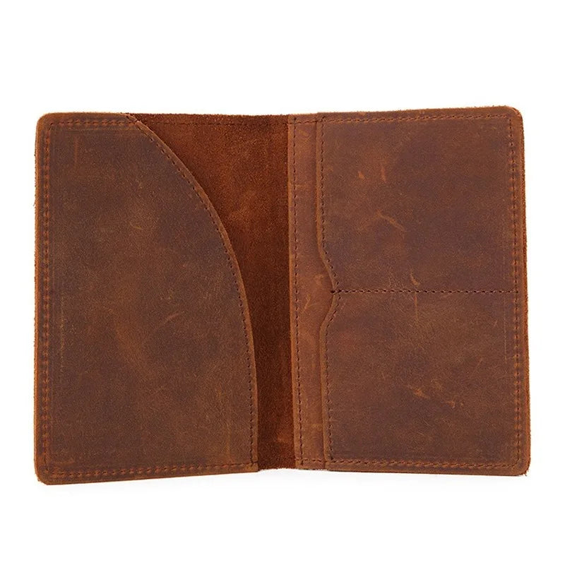 Open leather passport cover with card slots and center seam, dark brown with stitched border