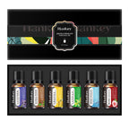 Aromatherapy essential oil set in a black gift box with six labeled bottles