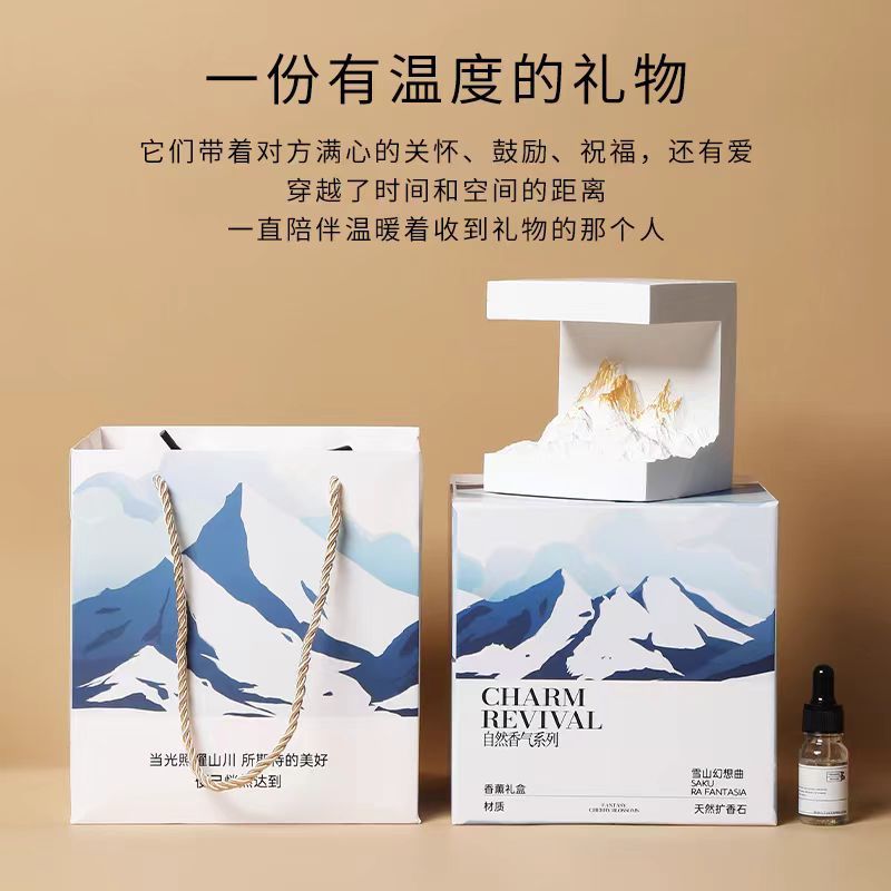 Aromatherapy essential oil lamp gift set with two boxes, lamp, and dropper bottle