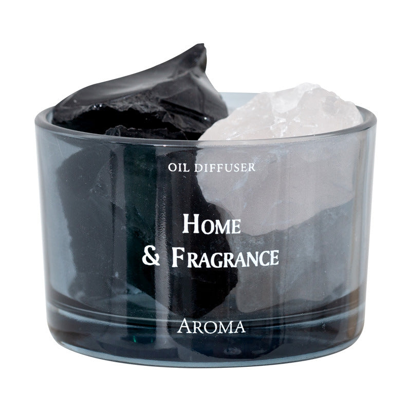 Dark glass oil diffuser cup with black and white crystal pieces