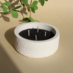 Stone crystal diffuser with black wax insert and three wicks, white textured base