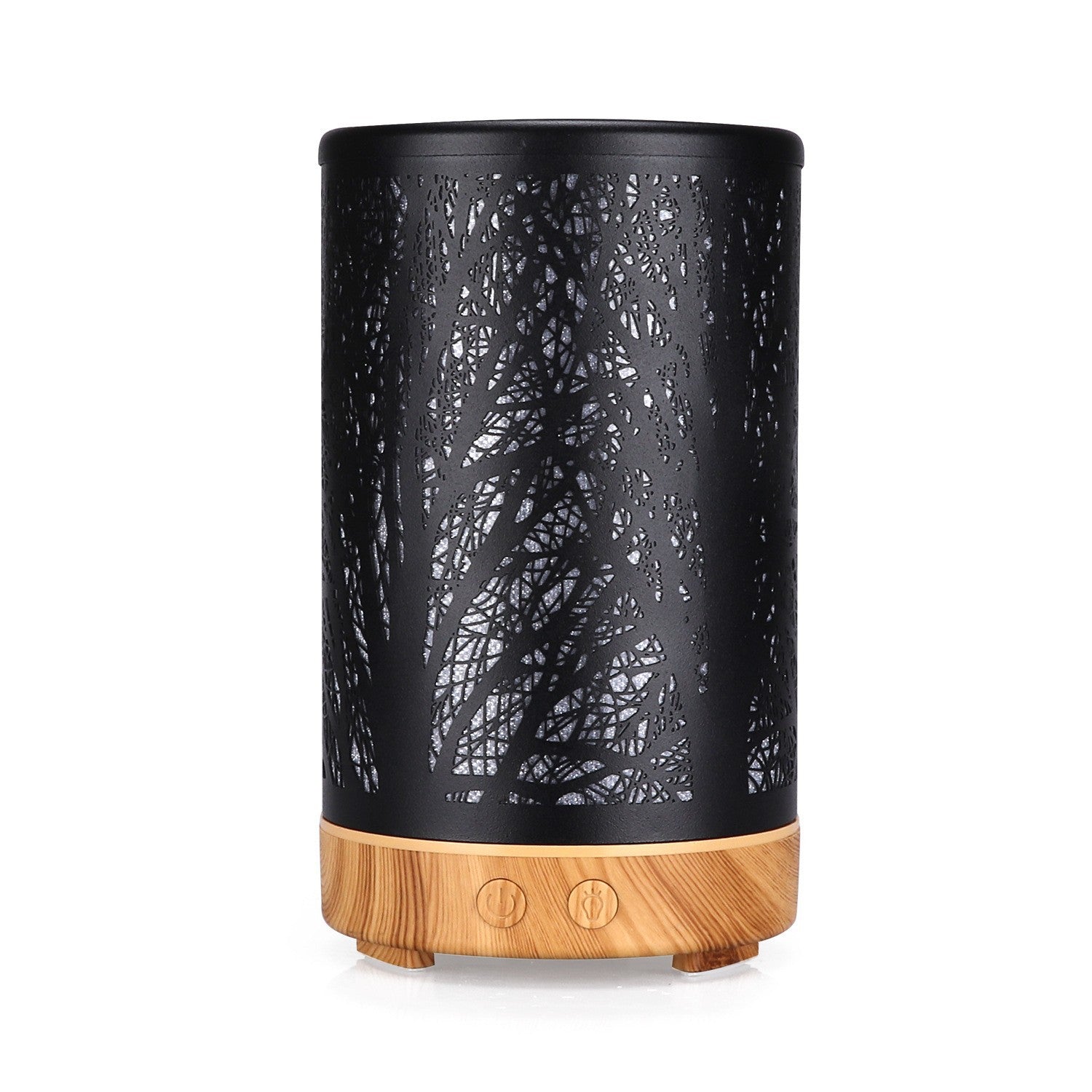 Black mini aroma diffuser with light wood base, forest tree silhouette pattern