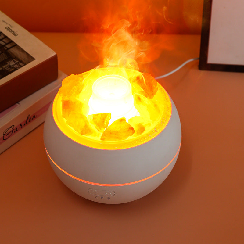 White salt stone crystal aroma diffuser, bright orange flame-like glow from top