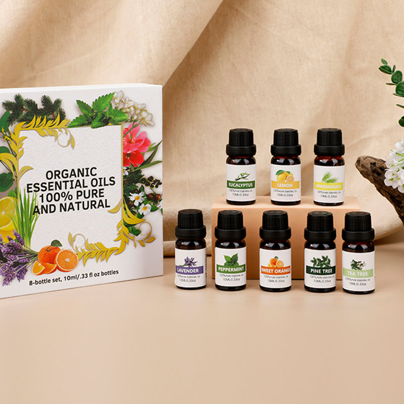Organic essential oil set in a white box with 8 bottles; includes lavender, eucalyptus, and citrus.