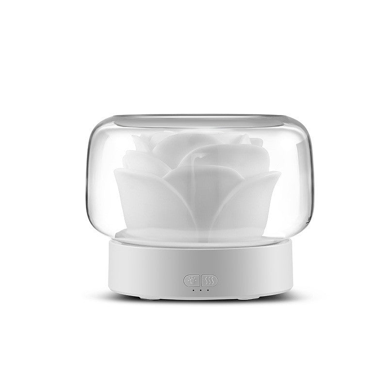Mini rose aroma diffuser with white base and clear dome, frosted rose insert visible.
