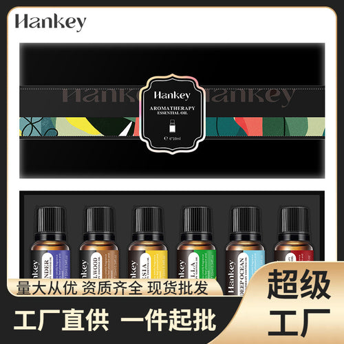 Essential oil set gift box showing six small bottles with black caps