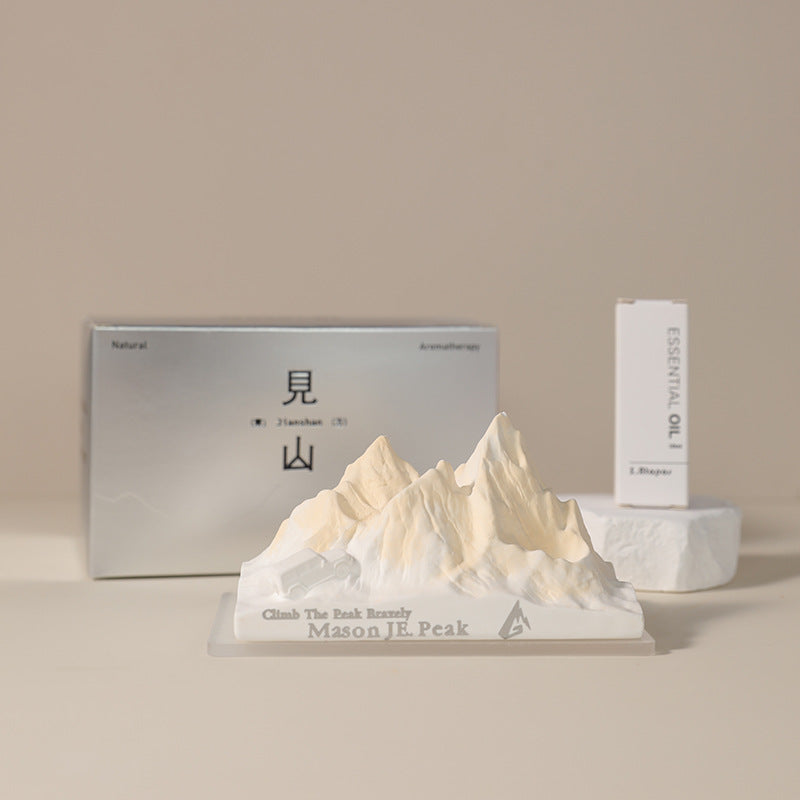 Car crystal diffuser with white mountain aroma stone on tray and two product boxes