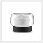 Mini rose aroma diffuser with black base and clear dome over frosted rose diffuser insert.