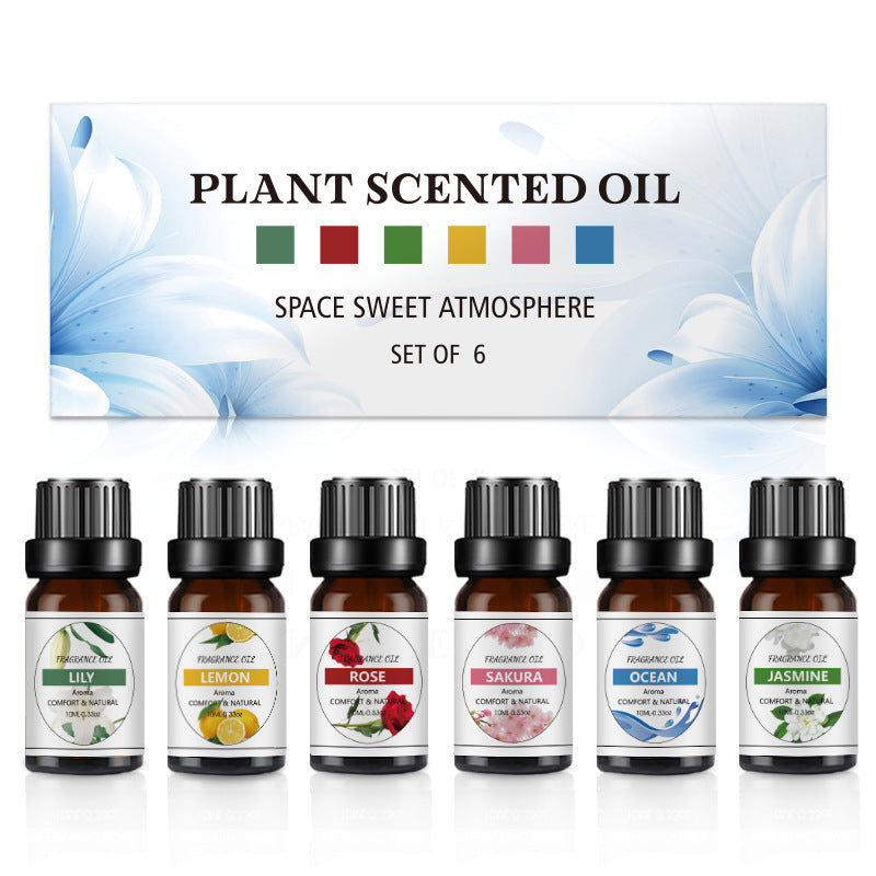 Scented oil set of 6 amber bottles with labels: lily, lemon, rose, sakura, jasmine, ocean.